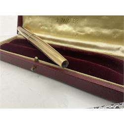 Three rolled gold Parker fountain pens, comprising an example with a gold nib marked 14K 585 and barrel with a shell stamp, a Parker 61 fountain pen with inset gold arrow to the nib, and another similar, all with striated decoration and arrow clips to the caps, L13cm, one with box