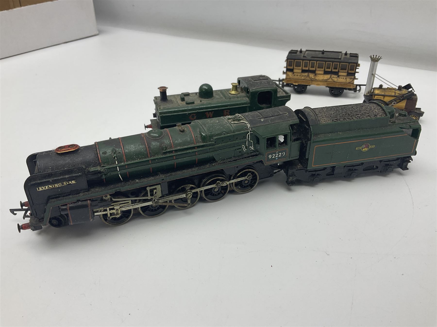Hornby/Tri-ang '00' gauge - six locomotives - Class 9F 2-10-0 'Evening Star' No.92220; Class A3 4-6-2 (no name or number); Dean Single 4-2-2 'Lord of the Isles' No.3046; Princess Class 4-6-2 'The Princess Royal' No.46200; Class 57XX Pannier 0-6-0 tank No.8751; and Stephenson's Rocket with one passenger coach; all unboxed (6)