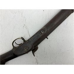 20th century Indian percussion musket, the 76cm barrel with two bands, indistinctly inscribed lock-plate, walnut full stock stamped 642 with brass butt and trigger guard and under barrel ramrod channel L121cm overall