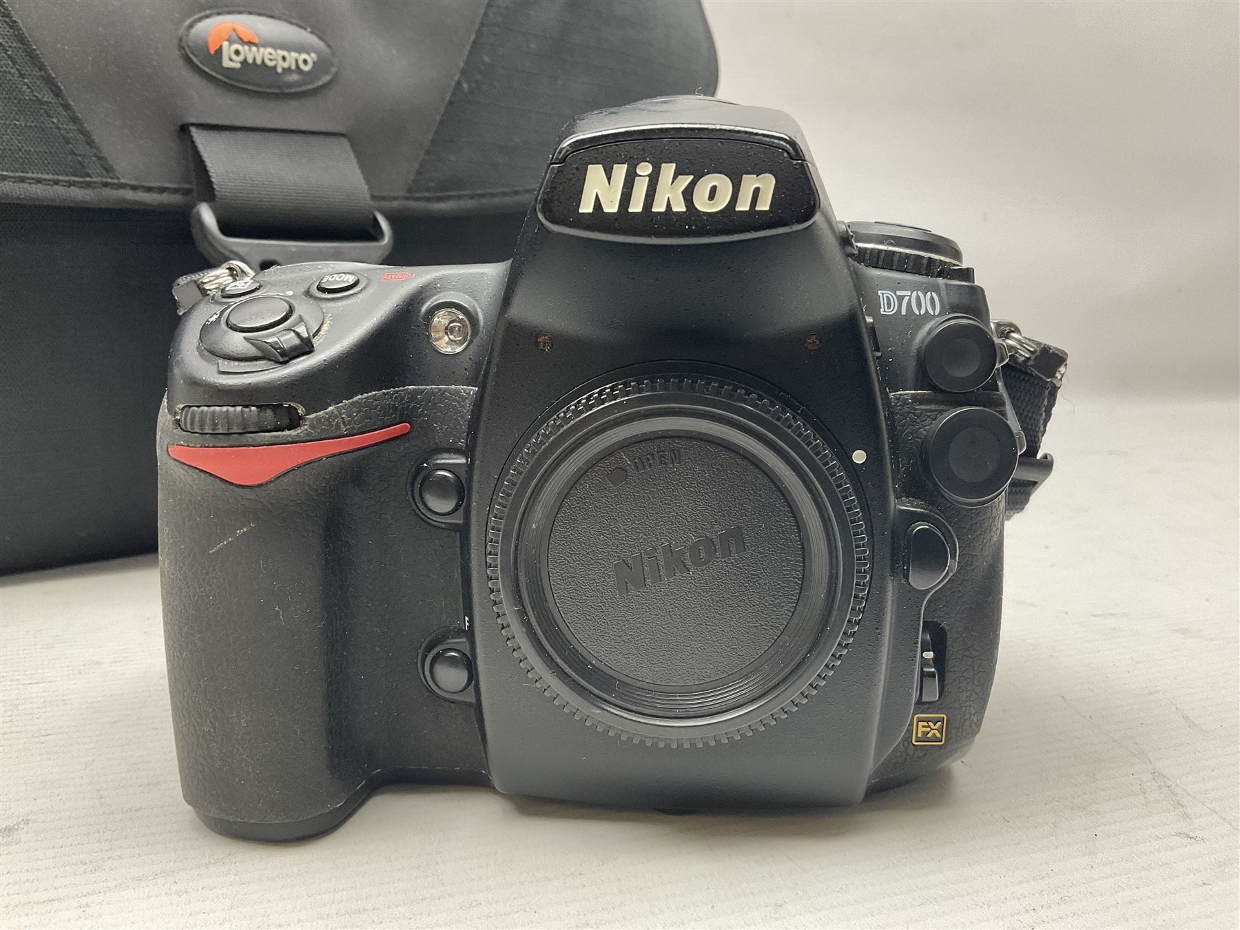 Nikon D700 camera body, serial no 2257597, with Lowepro camera bag