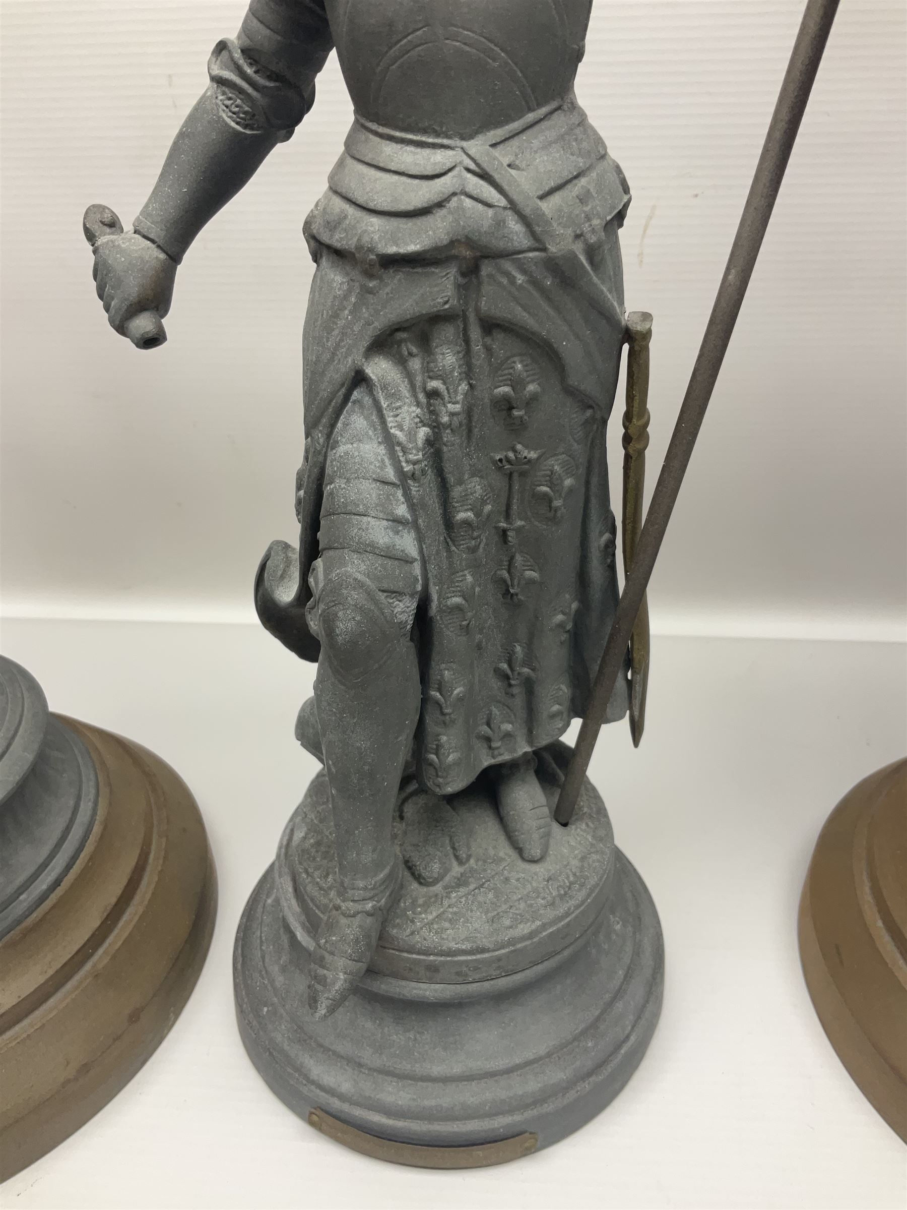 Pair of spelter figures modeled as Cavaliers, together with a spelter figure of Joan of Arc, largest H52cm