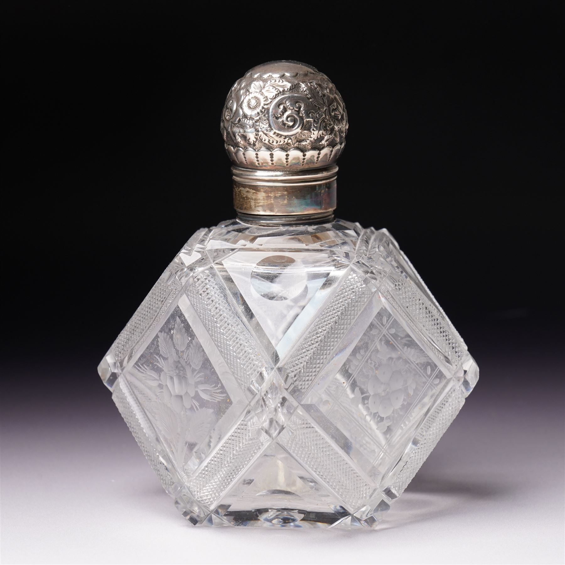 Edwardian glass globe scent flask with silver cover H13cm Birmingham 1905 and another of etched panel sided form with silver cover by Hilliard &Thomason (2)