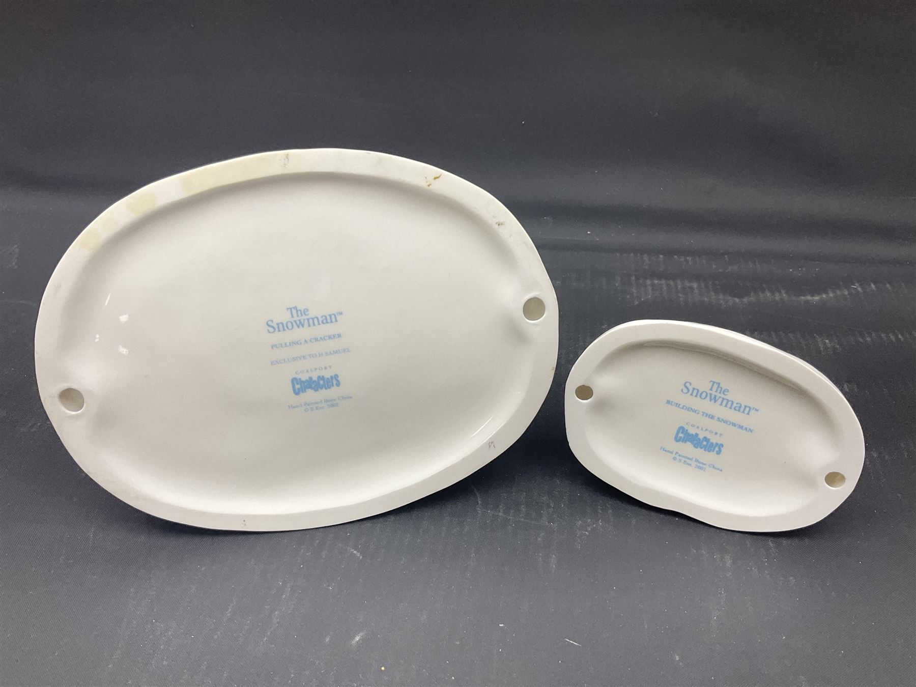 Four Coalport Characters The Snowman figures, comprising I'll Never Forget you with certificate, Pulling a Cracker and Adding a Smile, all with original boxes