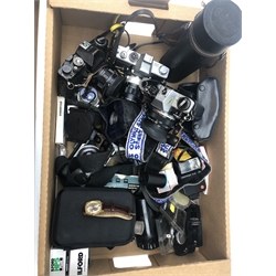  Assorted cameras and accessories including a Gaf L-17 camera, Minolta, Olympus OM 10 and other camera bodies, Soligor lens, cleaning kit and other accessories and a MuDu Doublematic wristwatch   