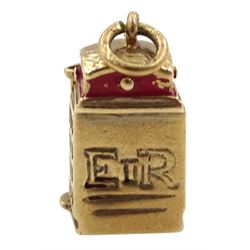 Three 9ct gold charms including telephone box, Queen Elizabeth 2 ship and crown, all hallmarked