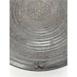 Dong Son style Southeast Asian bronze rain drum, the top decorated with concentric bands with stylised motifs and geometric shapes, central twelve point star, the tapered body with loop handles, the top set with animal figures