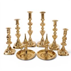 Pair of 19th century brass chamber candlesticks with detachable snuffers, together with th...