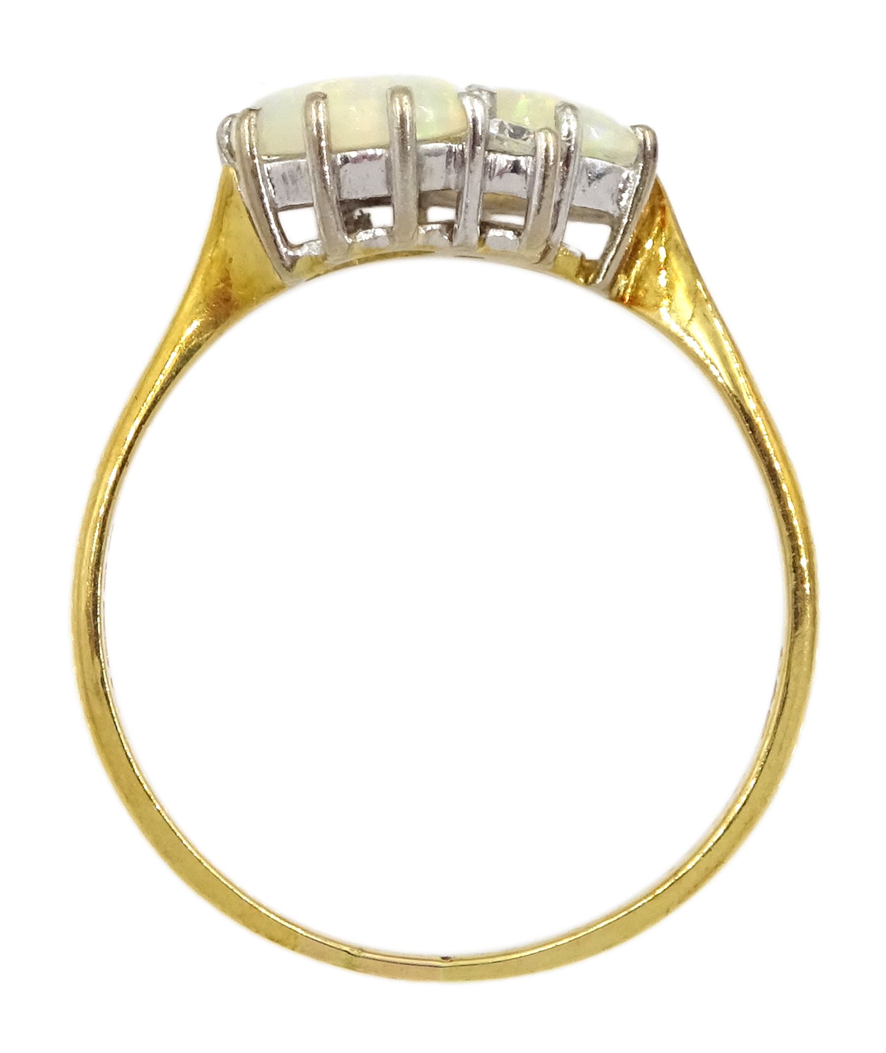 18ct gold two stone oval opal and two stone round brilliant cut diamond crossover ring, London 1981