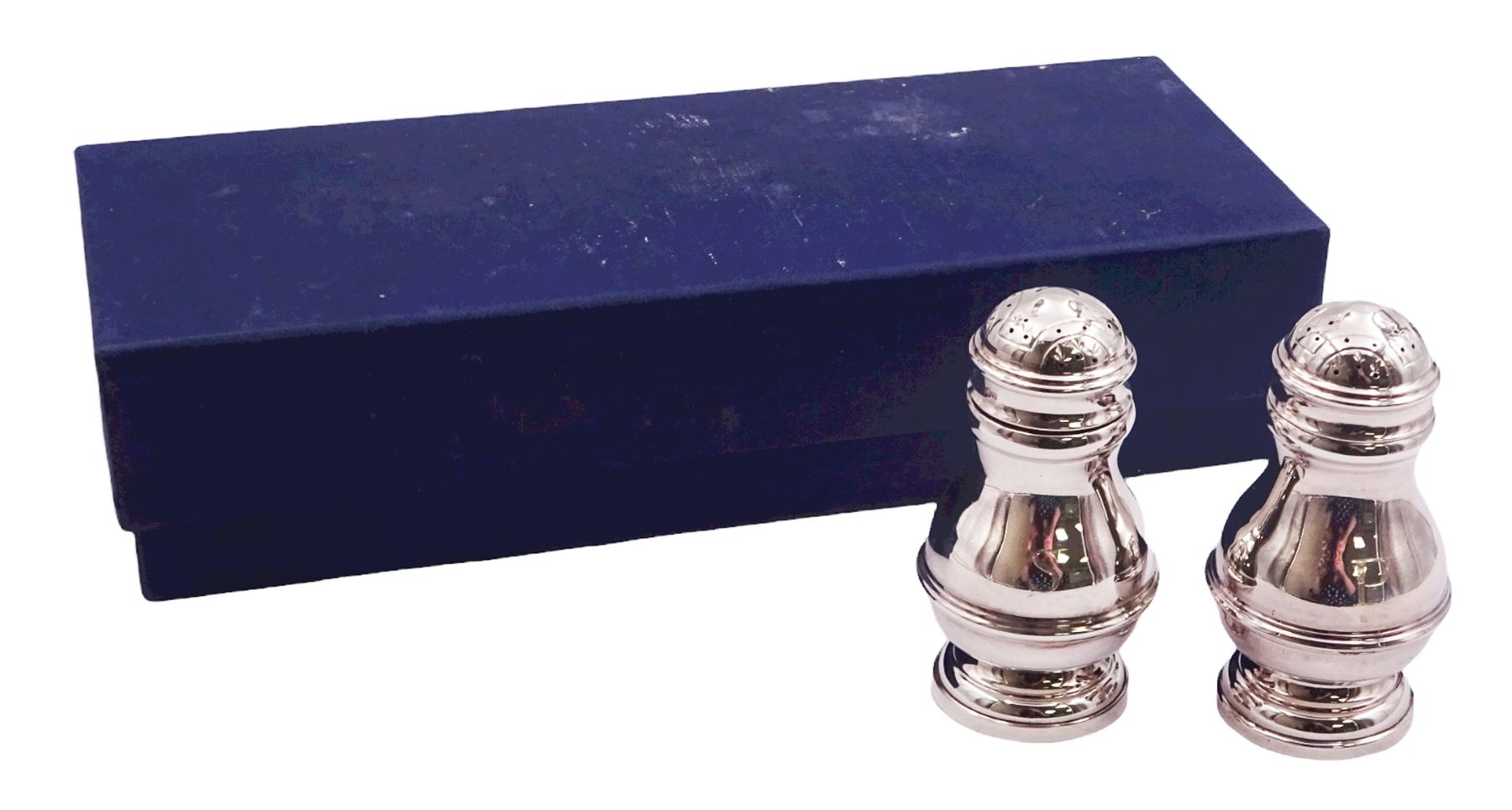 Pair of modern silver peppers, of baluster form with girdle, hallmarked David Shaw Silverware Ltd, London 1983, H7.5cm, contained in fitted box, approximate silver weight 2.84 ozt (88.6 grams)