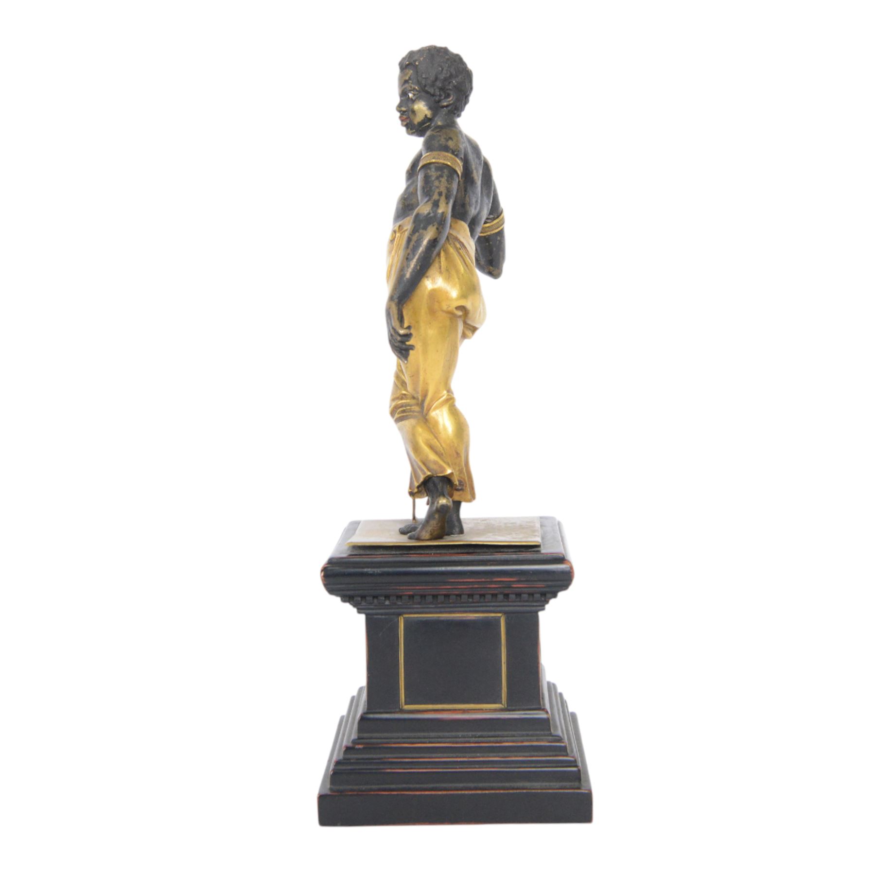 19th century brass finished, and gilded figure, probably originating from a clock, now set on associated base, H36cm

Note: Comparable figure sold Christies, Interiors sale, including the collection of the late Serge Baillache, 20 May 2014, lot 252