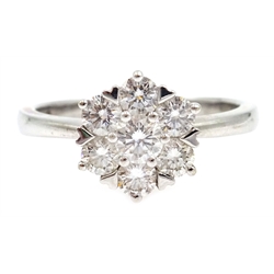  White gold seven stone diamond flower cluster ring, hallmarked 18ct, stamped DIA 100  