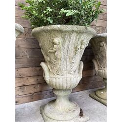 Set of four Victorian design cast stone Grecian urns, tapering form cast with figures and handles, square plinth bases