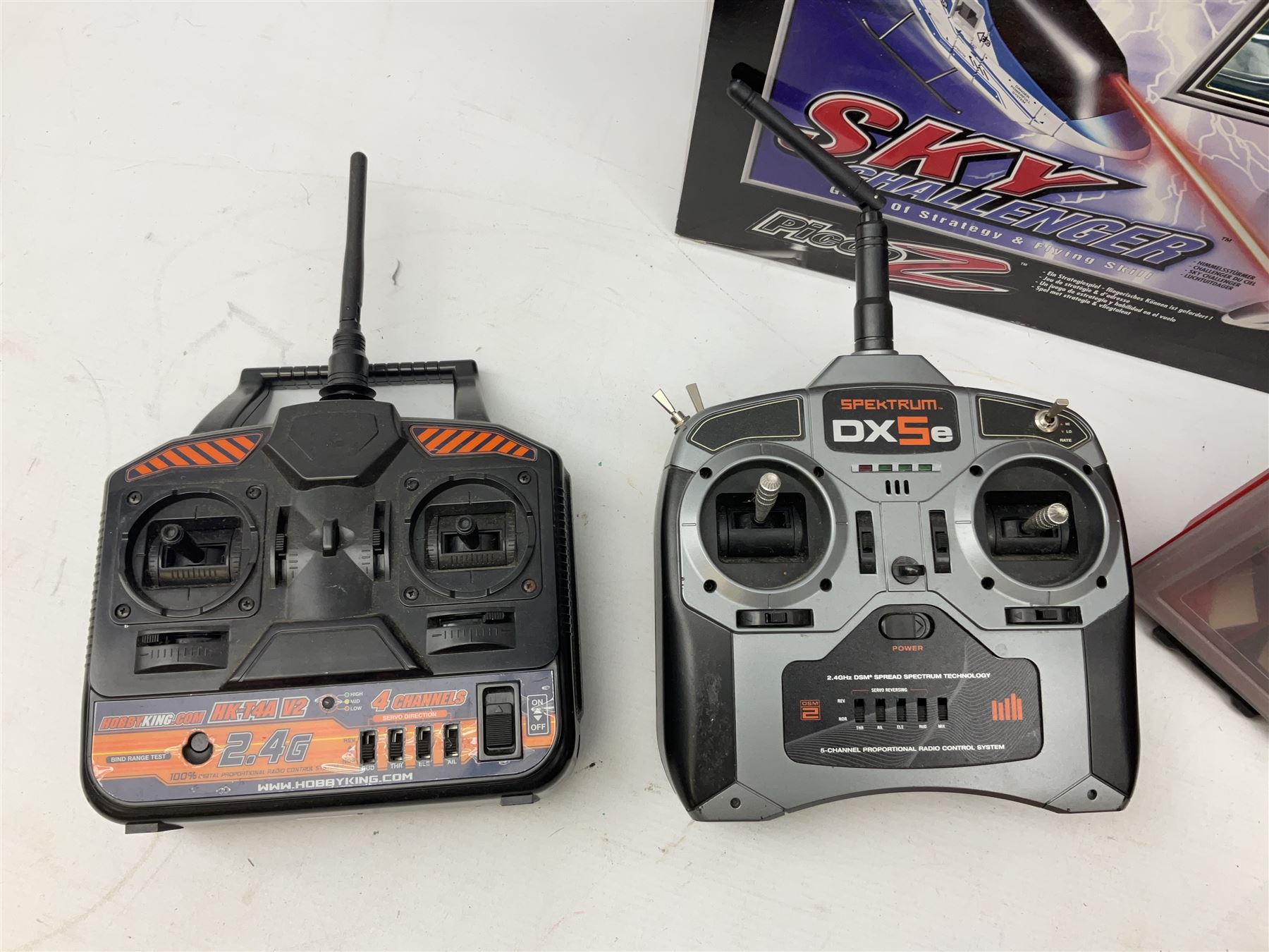 Sky Challenger game of strategy and flying skill by PicooZ Silverlit Electronics, Spektrum DX5E five channel radio control handset and other collectables 
