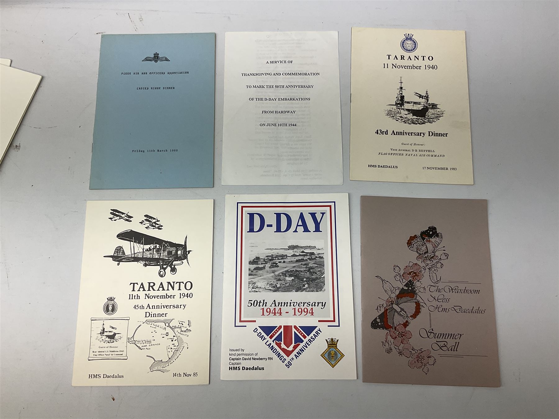 Framed WW2 'Special Order of the Day' poster date 24th May 1940 relating to Narvik in Norway; WW1 Princess Mary Christmas tin with quantity of uniform buttons; cigarette silk of the Prince of Wales in uniform; Royal Navy dinner menus, including HMS Daedalus Taranto forty-third, forty-fourth and forty-fifth anniversary dinners, 1983-1985, the wardroom mess summer ball, etc   