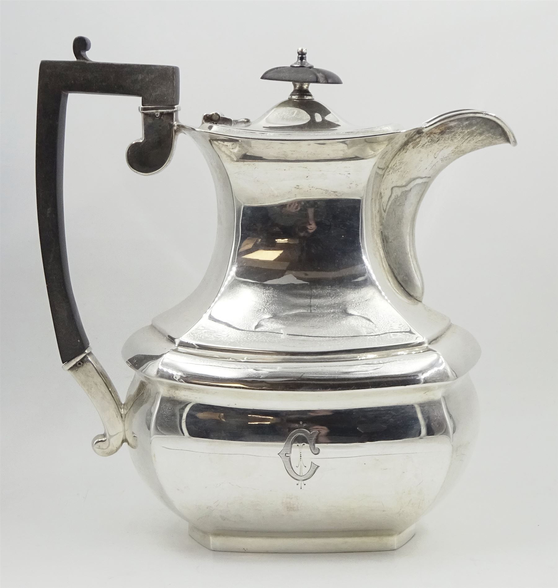 Raich Carter - presentation hallmarked silver two-handled tray of rounded oblong form with gadrooned rim by Wilson & Gill, 139 Regent Street, London, inscribed to the centre 'Presented to Mr. & Mrs. Raich Carter by the Lord Mayor of the City and County of Kingston-upon-Hull Alderman R.E. Smith J.P. on May 30th 1952on behalf of the many Admirers who subscribed to The Lord Mayor's Testimonial Fund in recognition of Raich Carter's genius as a footballer and his services to the City', London 1937 82oz L61cm; together with a hallmarked silver four-piece tea and coffee set by Cooper Bros. & Sons Ltd, the teapot of London shape with ebonised handle and knop, each piece engraved with an initial 'C', Sheffield 1920  60.5oz, teapot L29.5cm