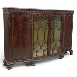 Edwardian mahogany serpentine breakfront display cabinet in the neoclassical style, the re...