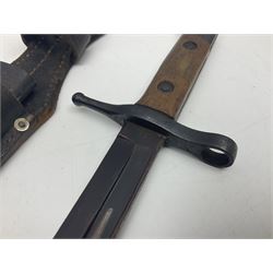 WW2 Italian Model 1891 bayonet with 30cm fullered blade; cross-piece marked PS 1941; in associated leather covered scabbard with frog L45cm overall