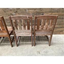 Set of 4 wooden garden chairs