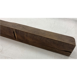 Very large fruitwood woodworking plane, of oblong section, impressed twice 1905, L130cm  