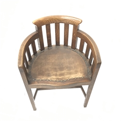 Early 20th century oak tub shaped chair, studded leather seat, square tapering supports, W54cm