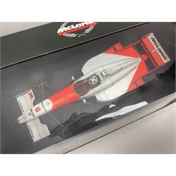 Three Paul's Model Art 1:18 scale die-cast McLaren racing cars - Mercedes MP4/11 D. Coulthard; MP4/4 A. Prost; and Mercedes MP4/10 M. Hakkinen; all boxed (3)