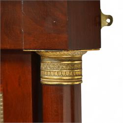 Rare pair of French Second-Empire neoclassical style mahogany mirrors with ormolu mounts, architectural pediment with central ormolu patera above flame mahogany frieze with honeysuckle flower and caryatid mounts, the frame with ormolu beading and bevelled mirror plates, flanked by turned columns with ormolu mounts above a reverse breakfront base, circa 1870