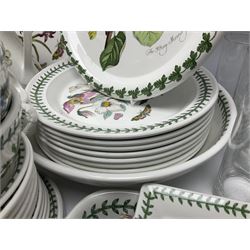 Portmeirion tea and dinner wares, mainly in Botanic Garden pattern, to include, eight dinnerplates, nine side plates, eight bowls, eight mugs, cheese dish and cover, covered tureen, platters, salt and pepper etc, 