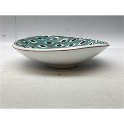 Stig Lindberg for Gustavsberg (Swedish 1916-1982) faience style dish decorated with painted repeating geometric design in teal, highlighted in black on a white ground, with painted marks beneath, D20cm
