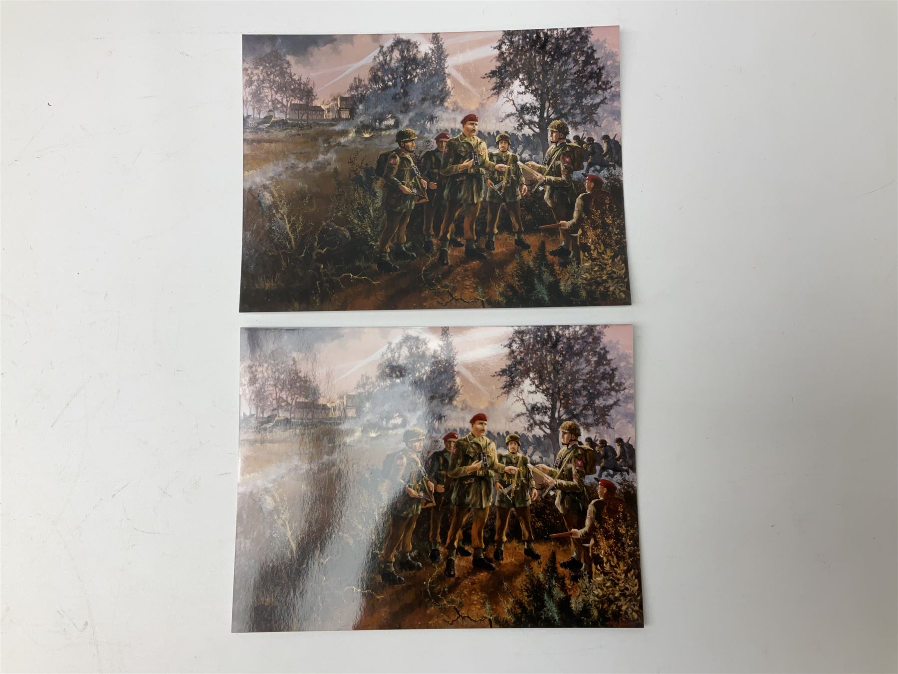 Presentation bronzed figure of a paratrooper by Peter Hicks mounted on a mahogany plinth with plaque inscribed ' Presented to Lieutenant General Sir Michael Gray KCB OBE President Army Parachute Association 1981-1987 An Outstanding Term of Leadership Friendship and Humour. Thank You All Ranks A.P.A.' H28cm; a brass Pegasus plaque H12cm; and small quantity of colour photographs and prints of military related paintings