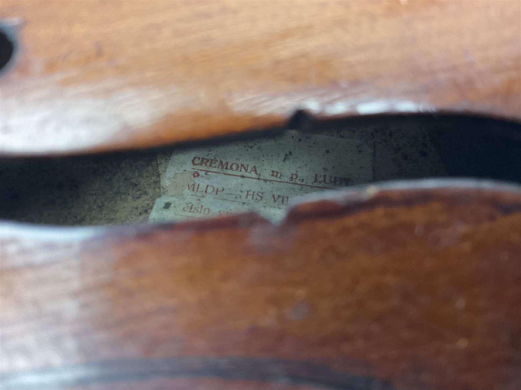 Saxony (?) violin c1950 with 36cm two-piece maple back and ribs and spruce top; bears label 'The Maidstone School Orchestra Association' L59cm overall; and 1950s Czechoslovakian violin for restoration; both in carrying cases (2)