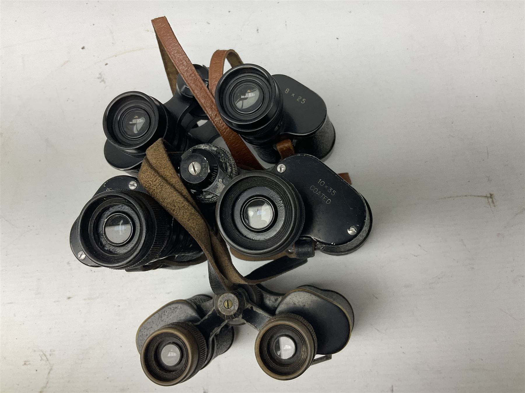 Eight cased pairs of binoculars, to include Zenith 10x50 field binoculars, Prinz 16x50, Prinzlux 10x50, Aquilus 10x35, etc, and a further binocular case