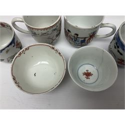 Two 18th century Chinese Yongzheng coffee cups, the first example decorated in polychrome enamel with rooster amidst blossoming peonies, the second decorated with deer and crane among rockwork and pine tree, together with two further 18th century Chinese coffee cups, an 18th century Chinese tea bowl, and a further tea bowl