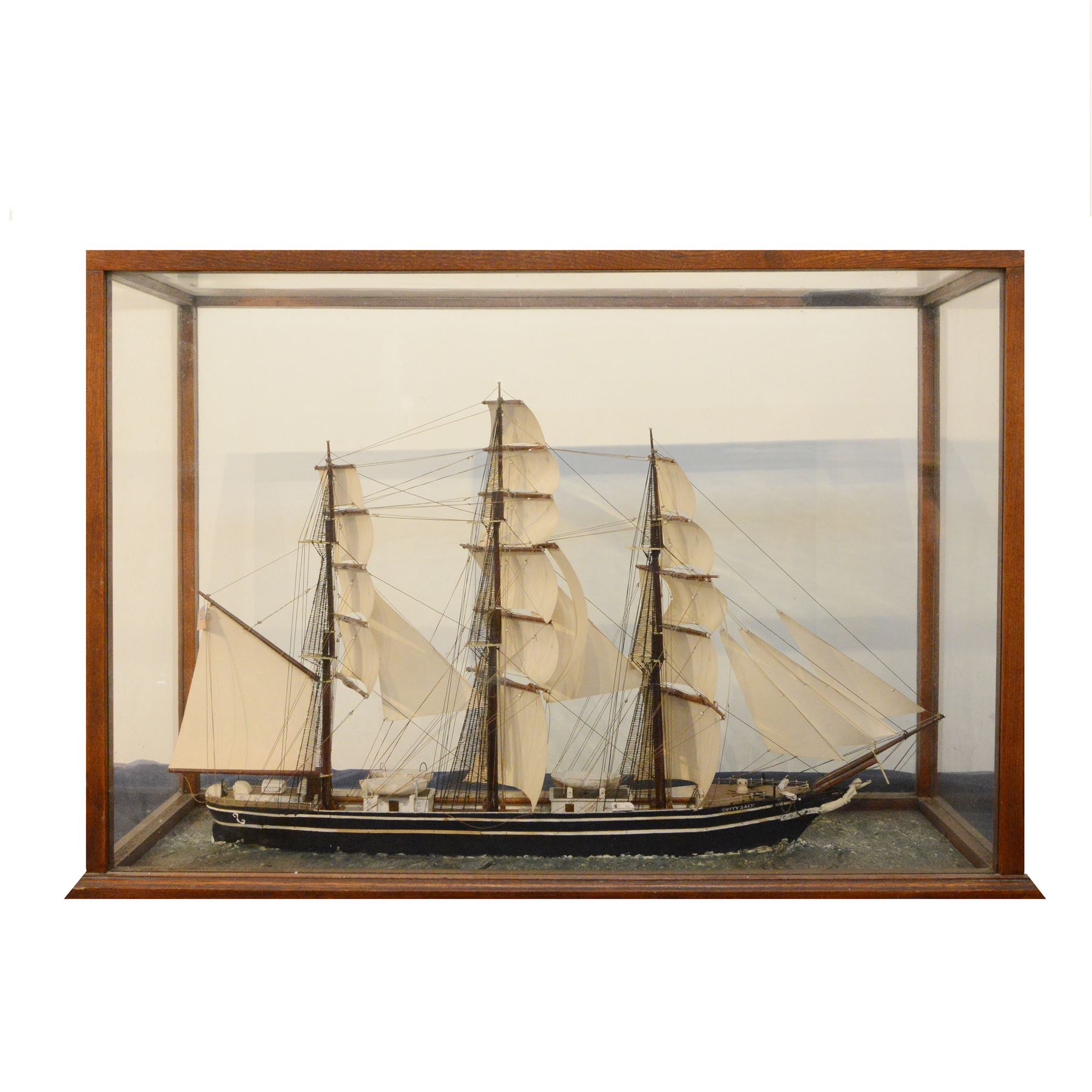 Early 20th century fully rigged waterline model of the Cutty Sark, contained within a glazed wooden case, case H54.5cm