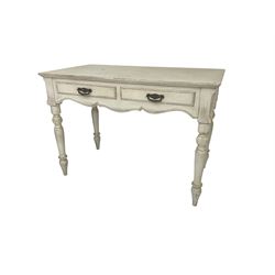 Painted pine side-table, rectangular top over two drawers with shaped apron, raised on turned supports