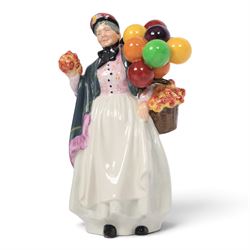 Royal Doulton six balloon seller figures, comprising The Old Balloon Seller HN1315 Biddy Pennyfarthing HN1843, Balloon Girl HN2818, Balloon Boy HN2934, Balloon Lady HN2935 and The Balloon Man HN1954 