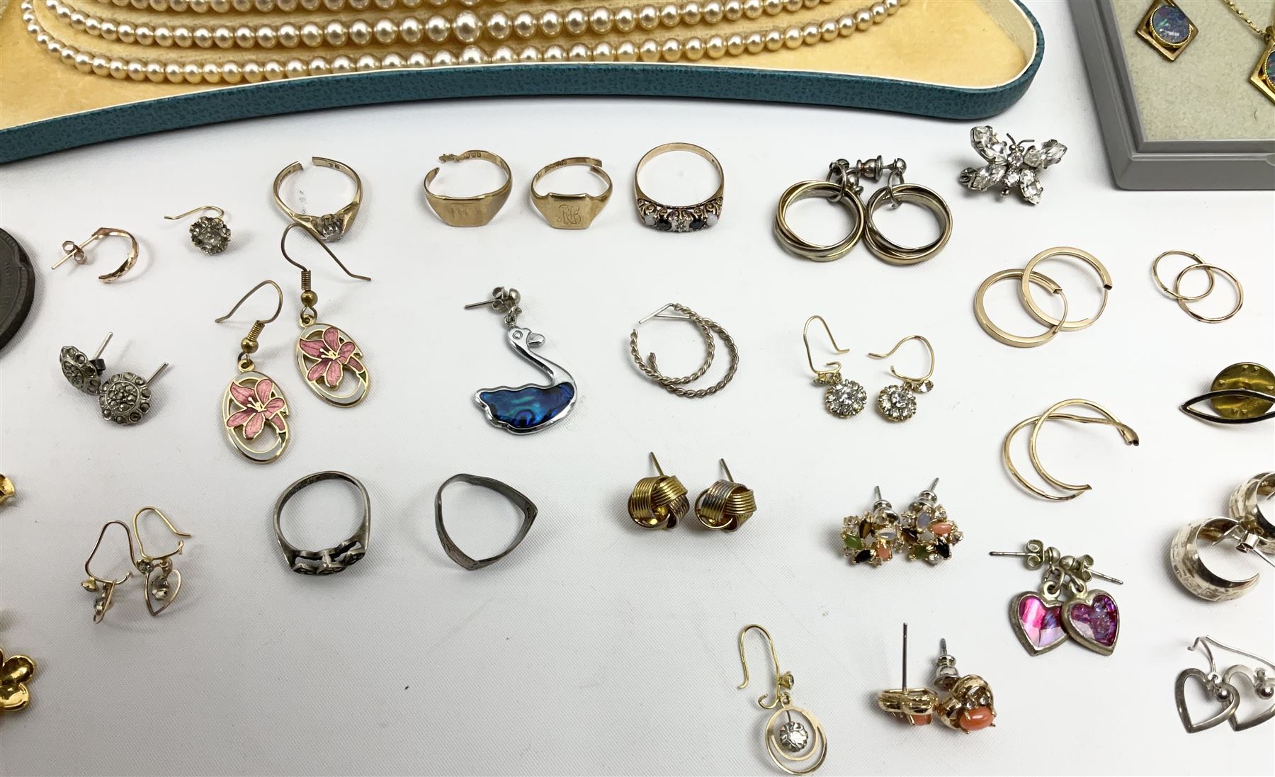 Two gold signet rings and a sapphire, opal and diamond ring, single stone diamond ring, pair of gold stone set earrings and other gold earrings, all 9ct stamped or hallmarked, silver earrings and other costume jewellery