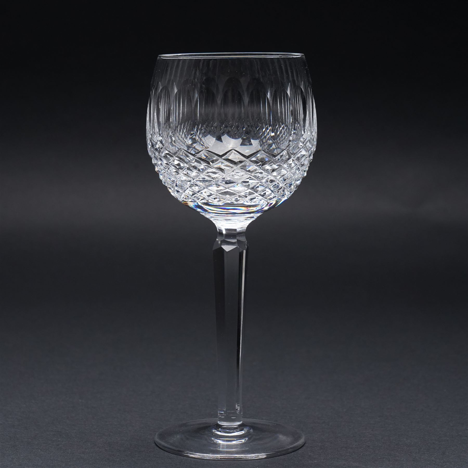Suite of Waterford Colleen pattern table glass comprising six claret glasses, six hock glasses, six small tumblers, six sherry glasses and two decanters