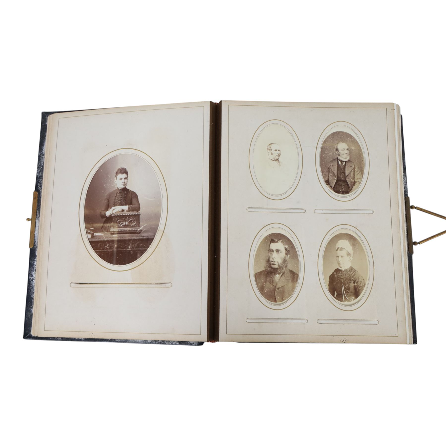 Two Victorian photograph albums, containing a collection of full and portrait Cartes de Visite, photographs and other ephemera