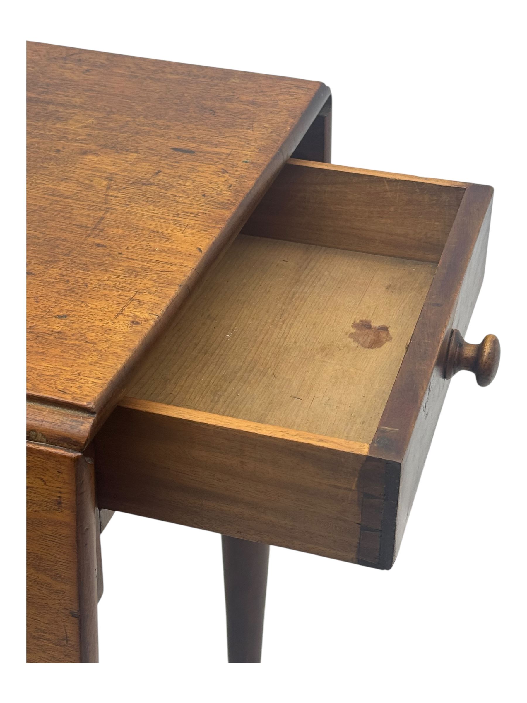 Georgian design mahogany drop-leaf table, rectangular top above a single drawer with brass handle, square supports united by arched undertier, on brass castors (W62cm, D65cm, H72cm); and a smaller mahogany drop-leaf table with single drawer on turned supports (W43cm, D61cm, H72cm)