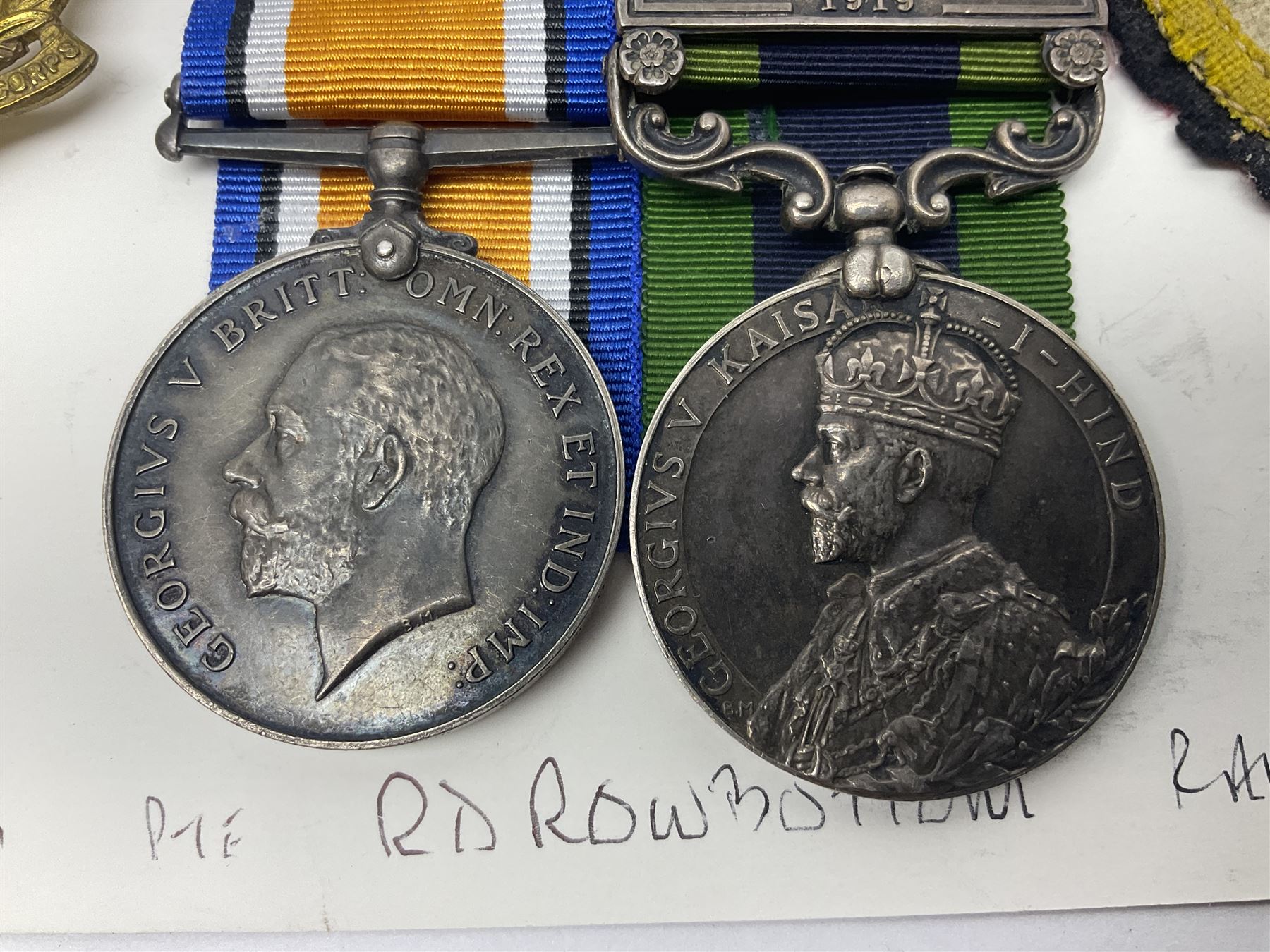 George V India General Service Medal with Afghanistan N.W.F. 1919 clasp and WW1 British War Medal awarded to 79561 Pte. R.D. Rowbottom R.A.M.C.; both with ribbons; card mounted with cap badge and Medical Corps cloth badge