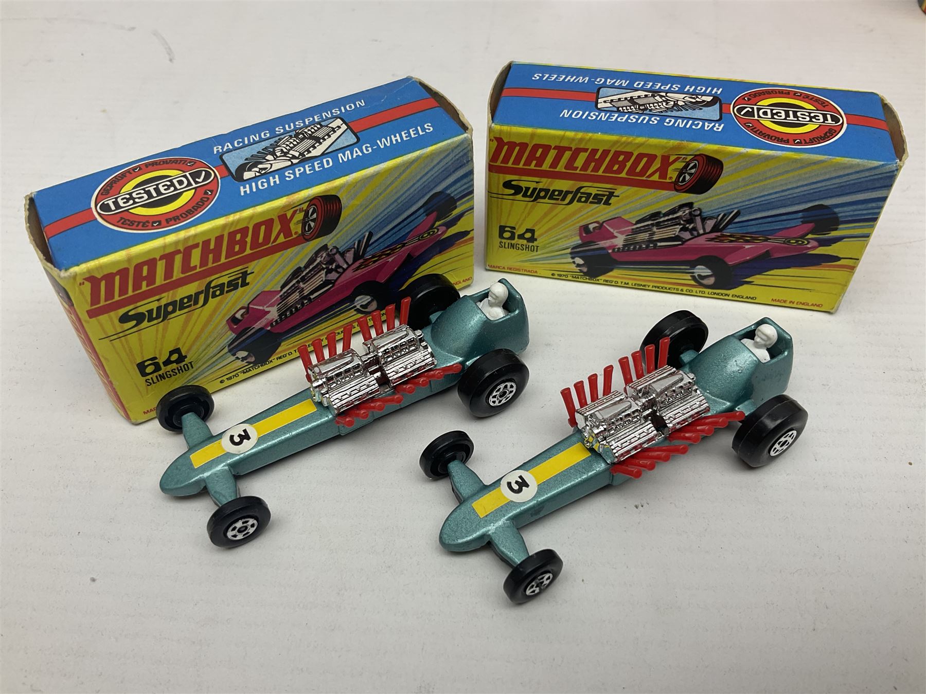 Matchbox 1-75 Series 'Superfast' ex-shop stock - eight models comprising two 62d Dragster, two 64c Slingshot Dragster, two 65d Saab Sonnet III and two 75c Alfa Carabo; all boxed; together with Matchbox trade catalogue c1973 in original vinyl cover (9)