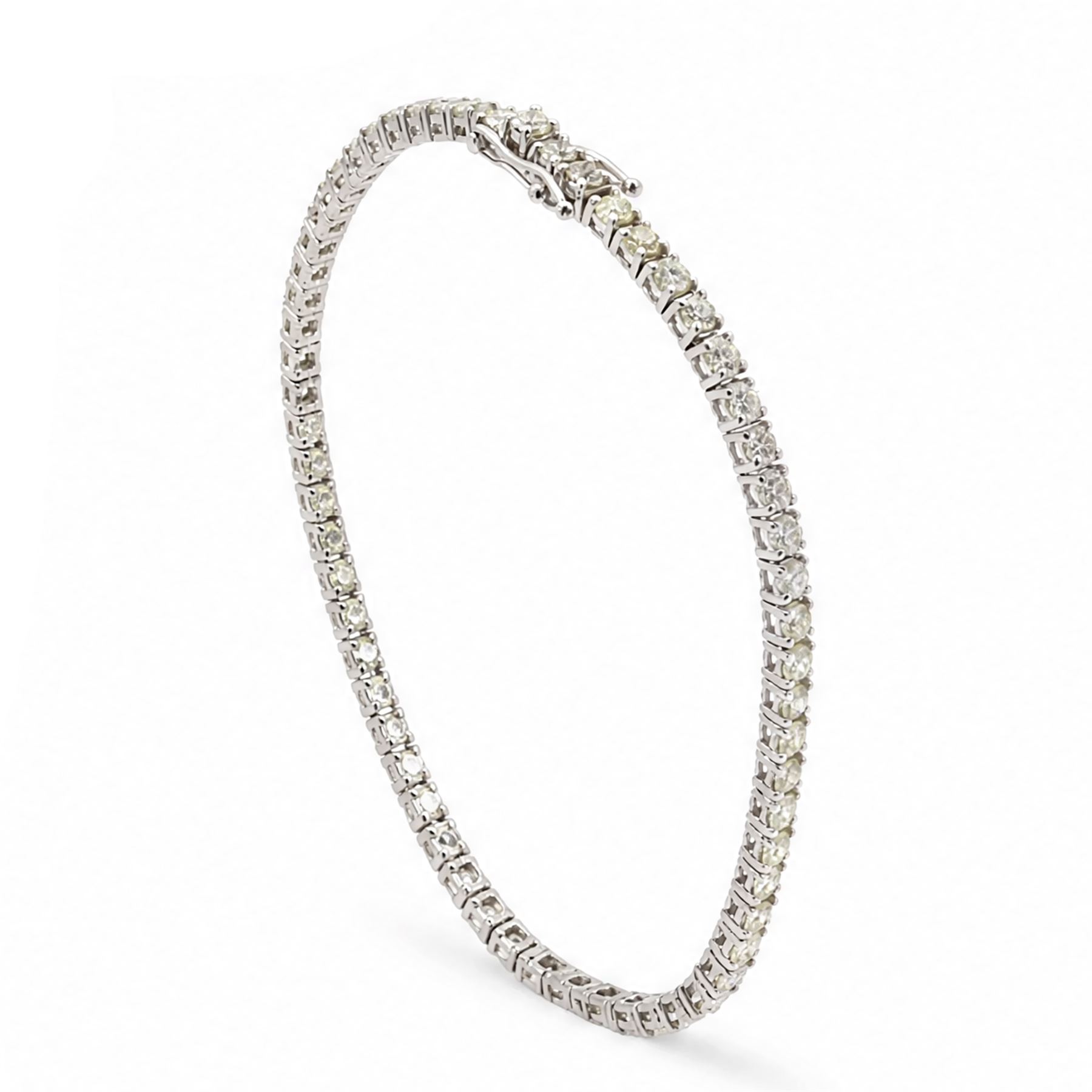 18ct white gold diamond bracelet, fifty-nine round brilliant cut diamonds, stamped 750, total diamond weight 4.29 carat