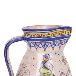 19th century Spanish faience jug with polychrome tin glaze decorated depicting a hunter and dog in a country scene within a geometric boarder, H18cm
