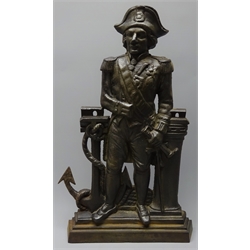  Victorian cast iron fireside figure of Admiral Nelson depicted standing holding a telescope in one hand, a fouled anchor and capstan to each side, marked Glenbervie H50cm  