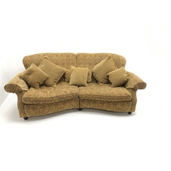 Three seat curved traditional sofa, scrolled arms, upholstered in a gold ground fabric with a floral pattern, W235cm, 