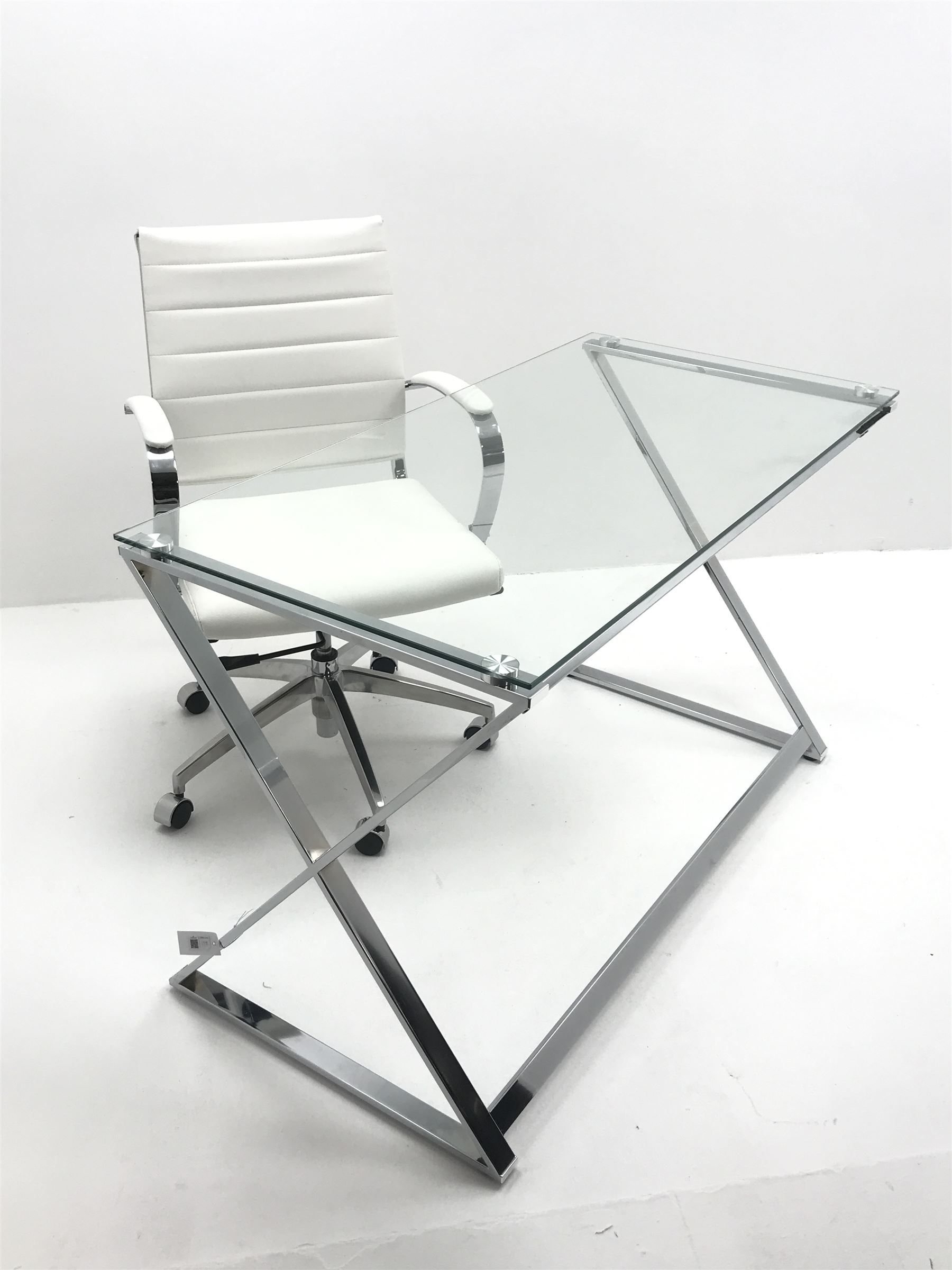 Chrome 'X' framed desk with rectangular glass top (W121cm, H75cm, D60cm) and matching chrome and faux leather swivel chair (W58cm)