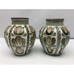 Pair of Denby Glyn Colledge stoneware vases of baluster form with floral decoration over cream ground, together two jardiniere in a similar design, vases H24cm