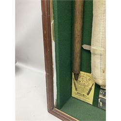 Four framed sporting memorabilia displays, the largest example containing 1930s cricket memorabilia, together with two fishing displays and a football display, each within wooden glazed frames, largest H105cm