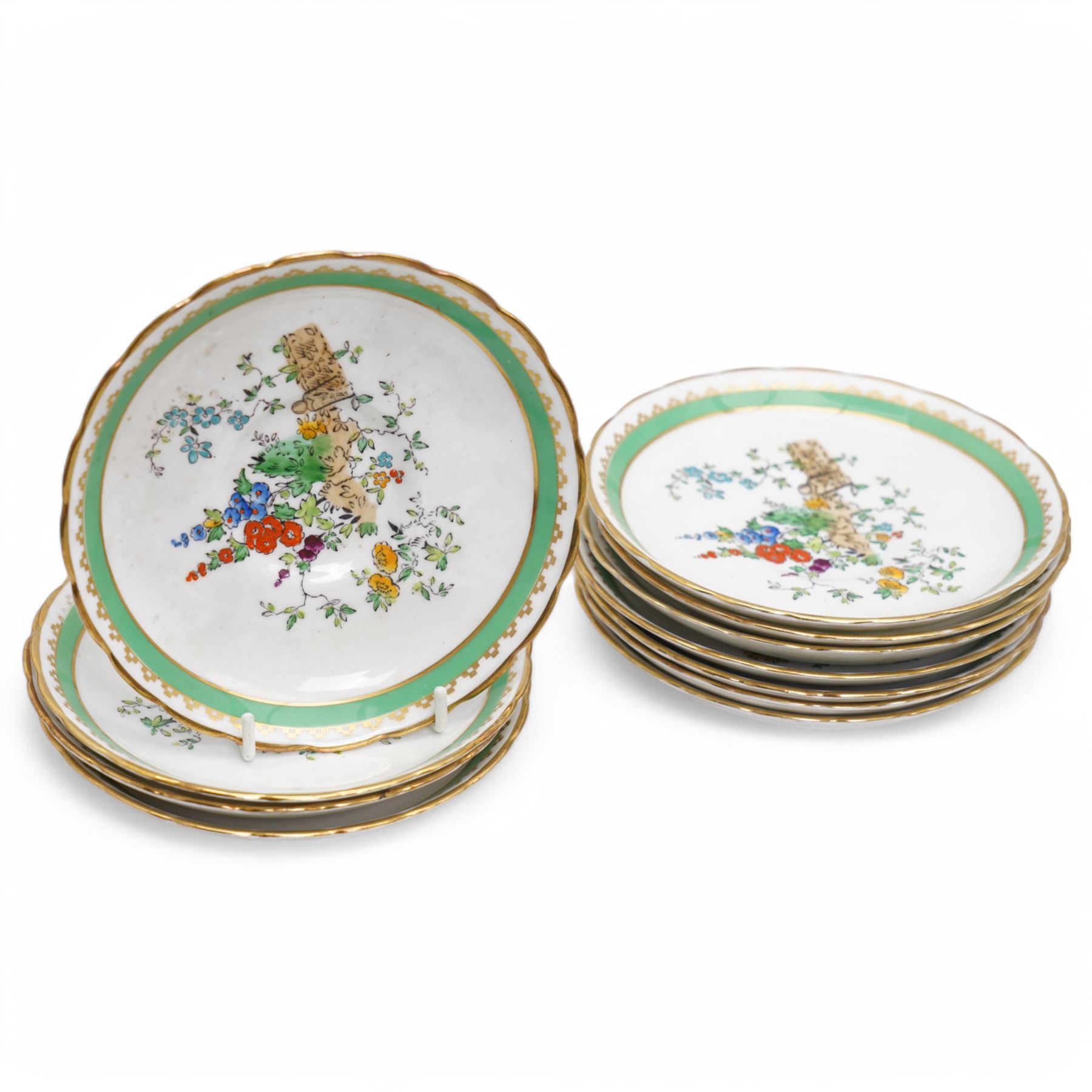 1930s Plant & Co Tuscan china tea set painted with flowers in blue, pink etc within a green border comprising twelve cups and saucers, twelve plates, two bread and butter plates, milk jug and sugar bowl (40)