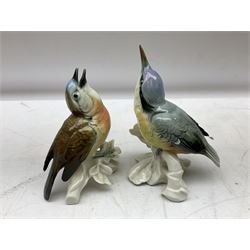 Two Karl Ens bird figures, Nuthatch and Warbler, together with Beswick English setter, Beswick Jack Russell and two other animal figures, largest example H17cm
